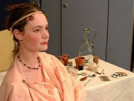 photo of woman posed after Roman style make up is applied