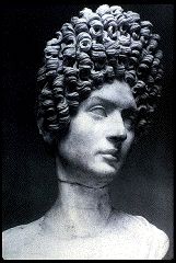 photo of statue with elaborate hairstyle